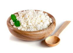 Cottage-cheese-in-a-wooden-bowl-isolated-on-a-white-background.jpg